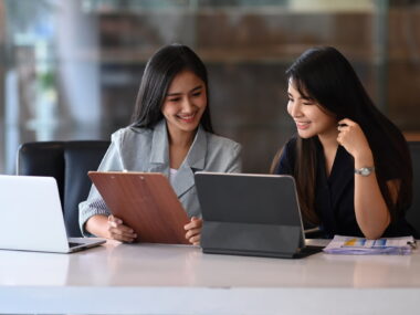 Two young woman working on a marketing campaign